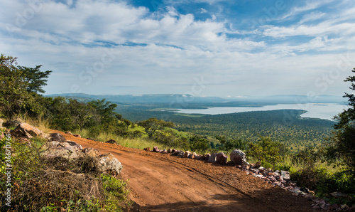 Landscape with road in the Akagera National Park, Rwanda, Africa