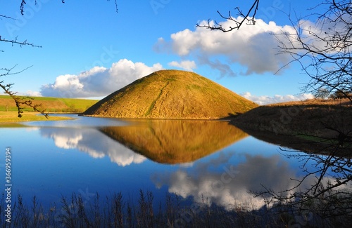 Silbury Hill reflected in water