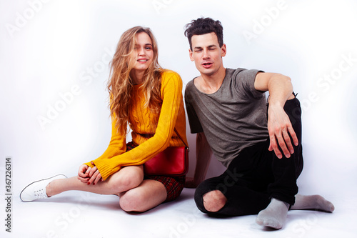 young attractive couple together having fun happy smiling isolated on white background, emotional posing, lifestyle people concept
