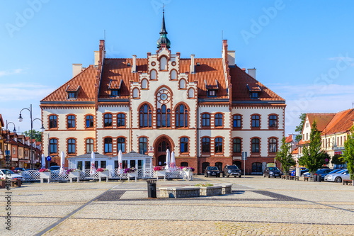 PISZ TOWN, POLAND - JUN 27, 2020: Town hall on square in Pisz town, Masurian Lakes region, Poland.