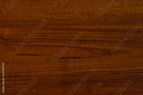 Polished wood surface. The background of polished wood texture.