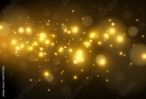 Bright beautiful golden sparks on a transparent background.