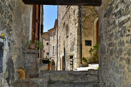 A narrow street in the old buildings of San Donato Val di Comino, a medieval village in the Lazio region.