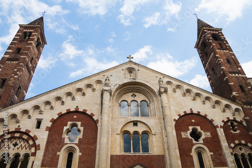 Facade of the cathedral (duomo) with bell towers in Casale Monferrato, Piedmont, Italy