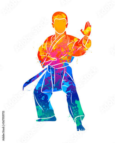 Abstract young boy in kimono training karate from splash of watercolors. Vector illustration of paints