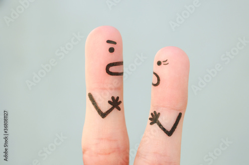 Fingers art of couple during quarrel.