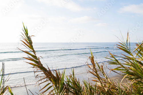Scenic California Pacific Coast background showing the waves crashing and gorgeous shoreline during a bright sunny day