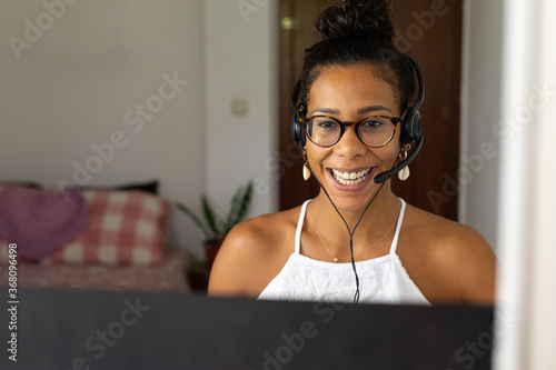 Young brazilian woman working from home