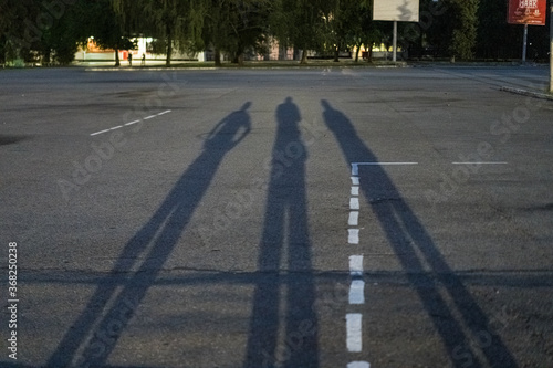 Shadows of people on earth