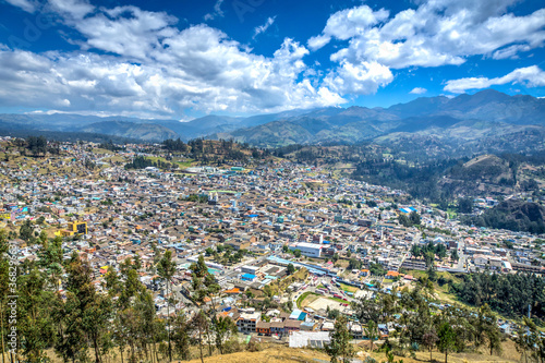 City of Guaranda, Chimborazo Province, Ecuador, taken from a high view point on a beautiful summer morning.