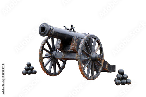 An ancient cannon with cores. Isolated on white.