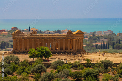 View of ancient greek Temple of Concordia with sea view - Valle dei Templi, Agrigento, Sicily, Italy