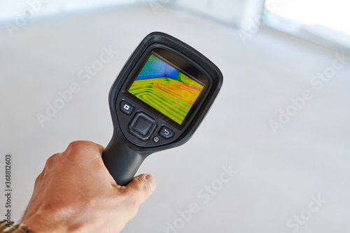 thermal imaging camera inspection for temperature check and finding heating pipes in floor