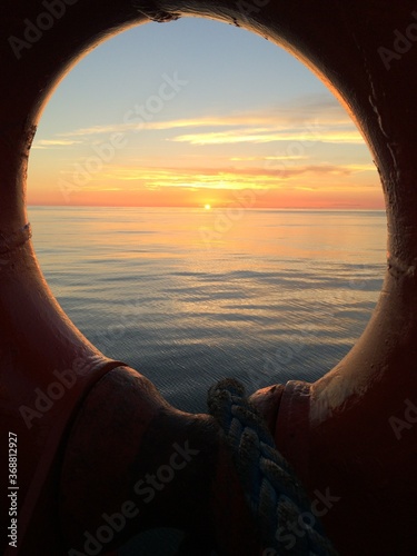 sunset through the ship's freeport