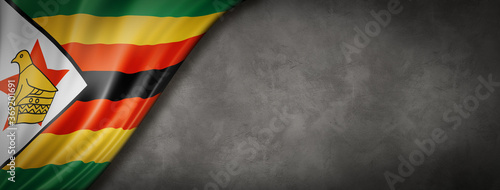 Zimbabwe flag on concrete wall banner
