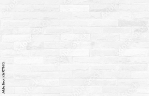 The old wall surface that is decorated with vintage white artificial stone, modern style for the background, the old white retro wall for the background can be beautifully assembled into the interior.