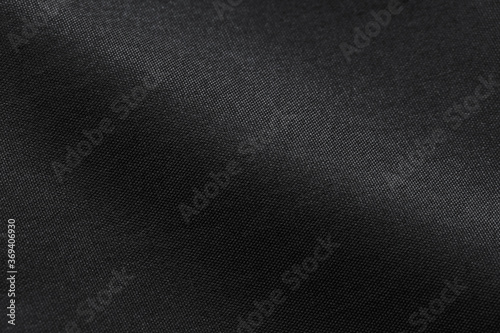 Canvas Polyester texture synthetical for background. Black polyester fabric textile backdrop for interior art design or add text message.