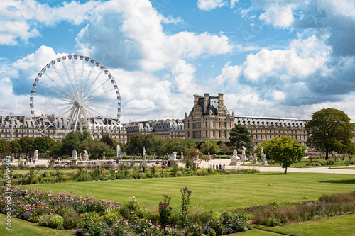 Famous Park "Jardin des Tuileries" with Ferris Wheel next to Louvre Museum