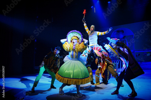 A young actor stands in the costume of a fairy-tale hero