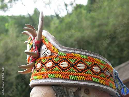 the head wear with wild boar tusks armlet and colorful beads is traditional culture of aboriginal in Taiwan