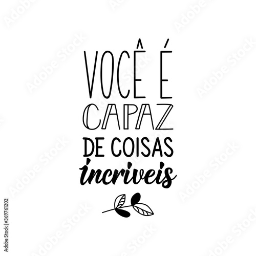 You are capable of amazing things in Portuguese. Lettering. Ink illustration. Modern brush calligraphy.