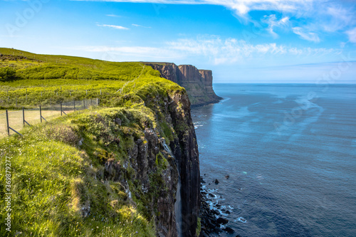 The coastal landscape at Isle of Skye, a big island in north highlands, Scotland, on a sunny day.