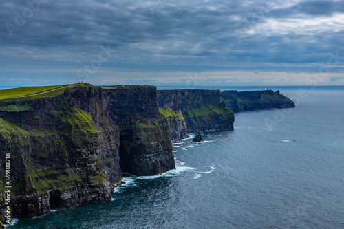 The Cliff of Moher, a landmark in west side of Ireland, on a cloudy day.