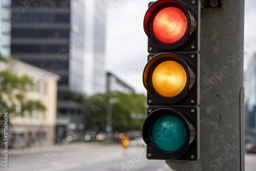 Traffic sign. Red and yellow traffic light.