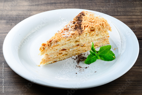 a piece of Napoleon cake from puff pastry