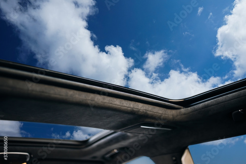 Panoramic glass sun roof in the car