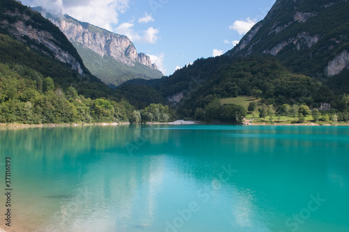 Panoramic view of Tenno lake in Trentino Alto-Adige during summer day, Italy