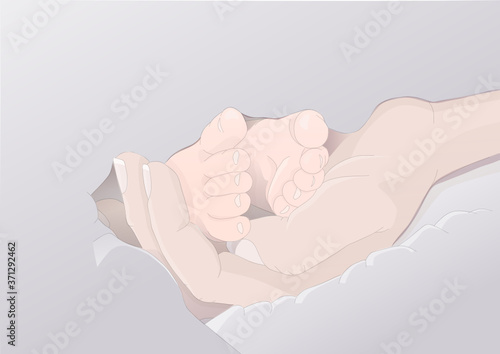 Stopki noworodka w kobiecej dłoni - otulone miękkim kocykiem