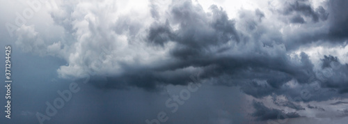 Stormy sky with gray clouds before the rain. Weather forecast concept.