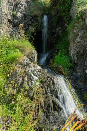 Waterfall on Port Mora beach, Scotland