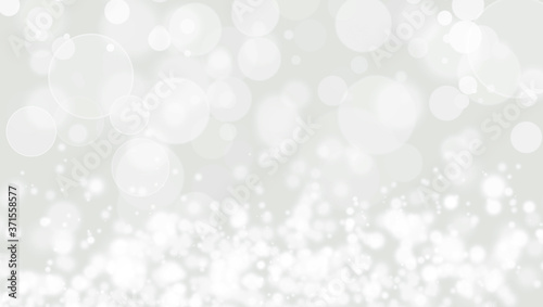 White lights bokeh, defocus glitter blur on gray background. Bokeh christmas blurred beautiful shiny.