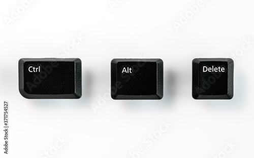 Black Ctrl, Alt, Del keyboard keys isolated on white, a combination of keys used to reboot a computer