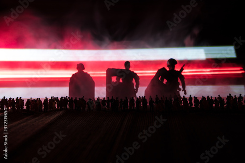Belarus presidential elections protest symbol flag on dark background. White and red colored light as symbol of Belarus flag. Creative artwork decoration. Crowd in dark. Selective focus