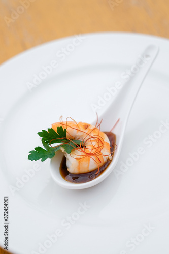 Shrimp close-up. Banquet service. catering food, snacks with cheese, jamon, prosciutto and fruit. Snacks for buffet at the reception. Decorated catering banquet menu with different food.