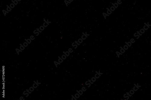 A blurred shot of Big Dipper in the constellation of Ursa Major in a sky full of stars