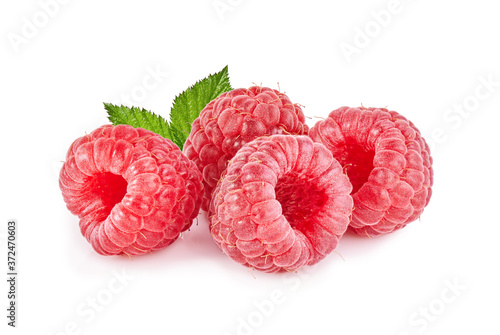 Raspberries with leaves isolated on white background 