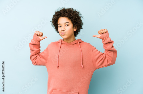 African american little boy isolated feels proud and self confident, example to follow.