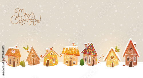 Christmas greeting card with cute gingerbread houses