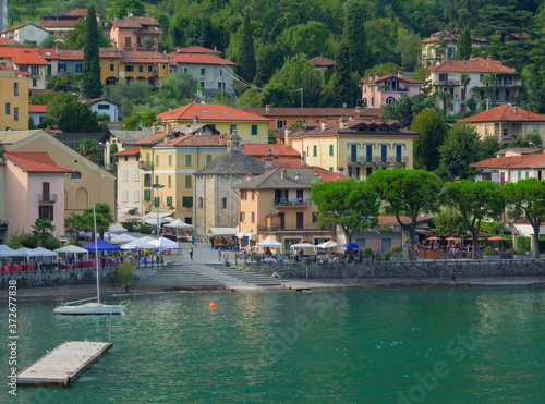 Lenno - Italy. small lakeside village overlooking the green waters of Como Lake in the tourist season