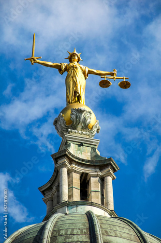 Scales of Justice of the Central Criminal Court fondly known as the Old Bailey London, England, UK the main block dates from 1902 which which is a popular travel destination tourist attraction