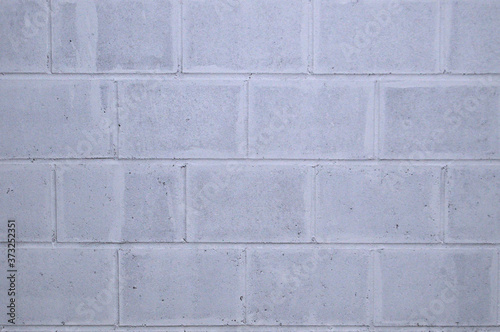 Beton wall. Brick wall. White and gray texture. Background.
