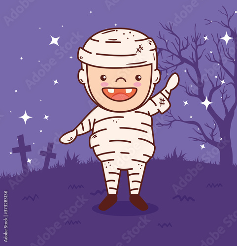 cute boy disguised of mummy for happy halloween celebration in dark night vector illustration design