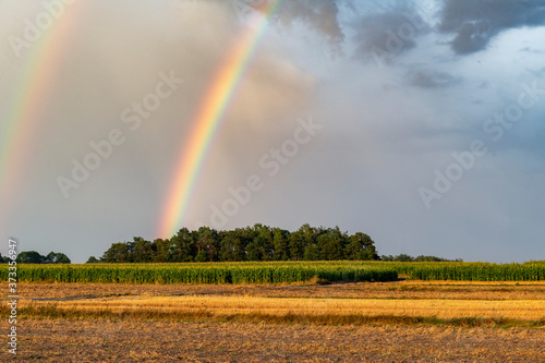 Beautiful rainbow on the stormy sky