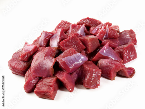 Raw Roe Deer Ragout - Wild Game Meat on white Background - Isolated