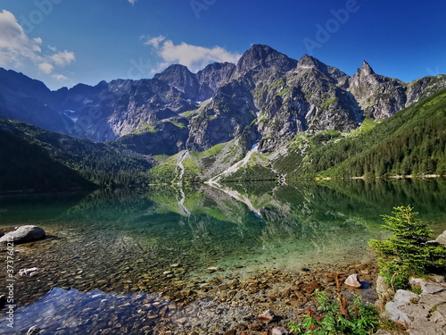 Morskie Oko has a view. Summer in the Tatras, holidays in the mountains. Poland Tatry.