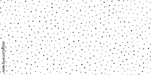 Seamless pattern with random black dots on white background. Vector.